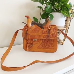Vintage tooled leather saddle bag